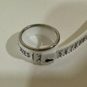 Silver toned ring​​​​​​​